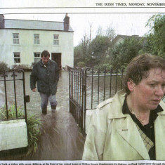Teresa Tuck outside her flooded home November 1999