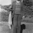 Fisherman with his catch c.1930