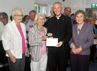 Fr Alan with Mary Maguire, Eileen Lydon and Tess Maloney. | Tom Broderick