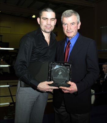 Bernard Dunne presents award to Martin Lee who was the first person to win all Ireland  for Oughterard boxing club in 1969 and a second in 1970. | Tom Broderick
