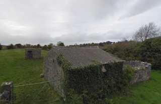 View of some outbuildings on opposite side of road